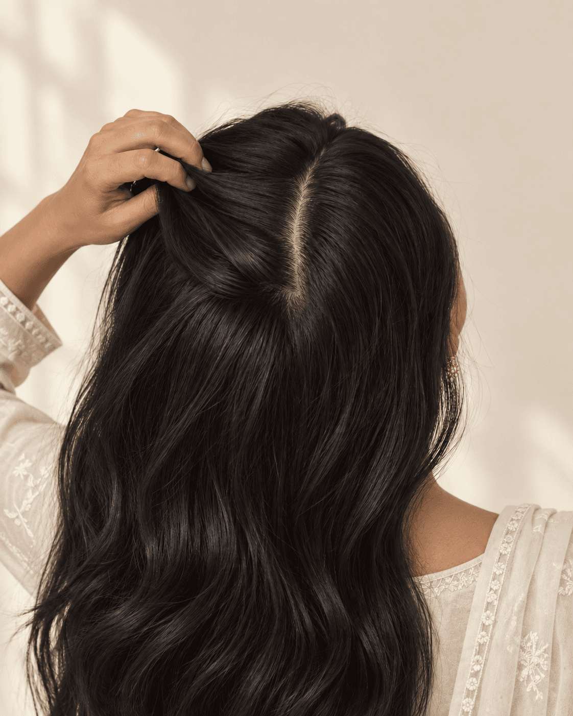 Close view of a Pakistani woman's hair and scalp